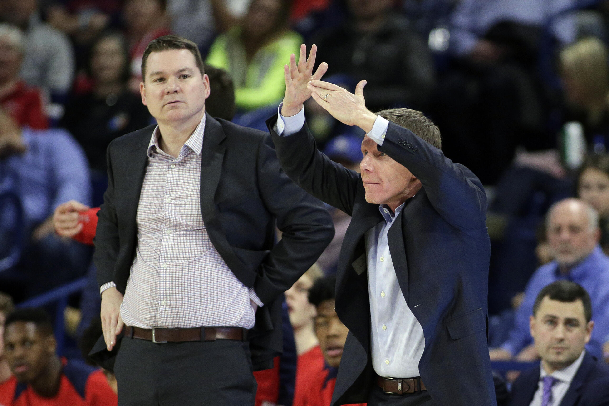 Gonzaga assistant coach Tommy Lloyd, left, alongside head coach Mark Few, has been hired as the new head coach at Arizona, Wednesday, April 14, 2021. The school says Lloyd, a graduate of Kelso High School, will receive a five-year contract, pending approval by the Arizona Board of Regents.