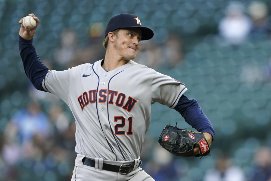 Houston Astros starting pitcher Zack Greinke throws to a Seattle Mariners batter during the first inning of a baseball game Saturday, April 17, 2021, in Seattle. (AP Photo/Ted S.