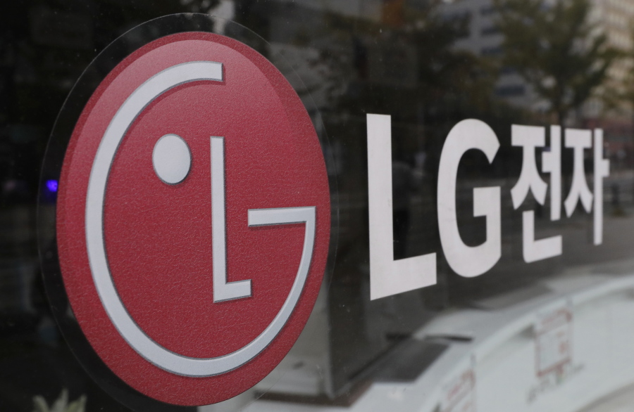 FILE - This Oct. 26, 2017 file photo shows the corporate logo of LG Electronics in Goyang, South Korea. Two South Korean electric vehicle battery makers have settled a long-running trade dispute that will allow one of them to move ahead with plans to make batteries in Georgia. That&#039;s according to a person briefed on the matter.