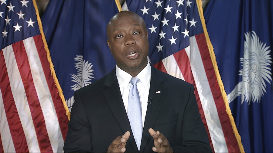 In this image from Senate Television video, Sen. Tim Scott, R-S.C., delivers the Republican response to President Joe Biden's speech to a joint session of Congress on Wednesday, April 28, 2021, in Washington.