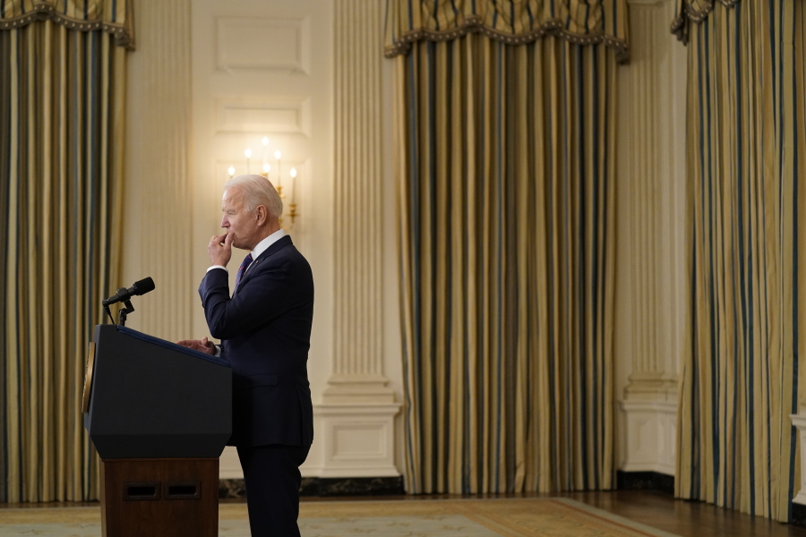 President Joe Biden pauses as he speaks about the March jobs report in the State Dining Room of the White House, Friday, April 2, 2021, in Washington.