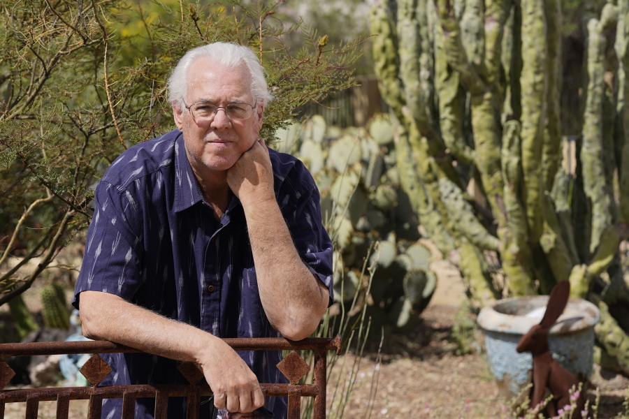 In this April 8, 2021, photo Tom Rawles poses for a photo in Carefree, Ariz. Rawles is an ex-Republican county supervisor in Maricopa County, which includes Phoenix and was critical in Biden carrying swing-state Arizona. After voting for Biden, Rawles registered as a Democrat. (AP Photo/Ross D.