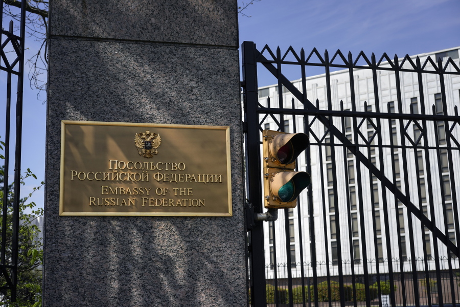 The entrance gate of the Embassy of the Russian Federation is seen in Washington, Thursday, April 15, 2021. The Biden administration has rolled out a sweeping set of sanctions on Russia over its election interference, hacking efforts and other malign activity.