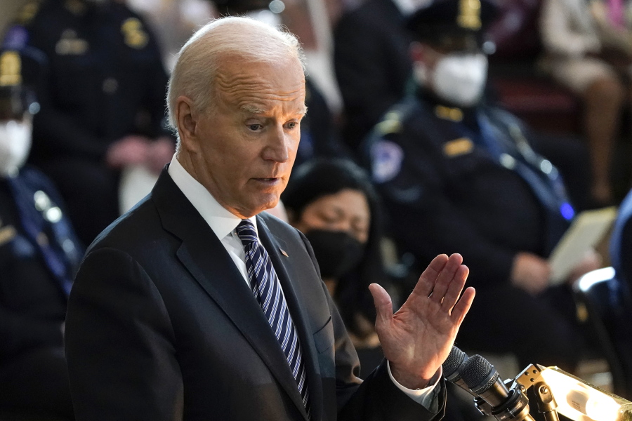 President Joe Biden speaks during a ceremony to honor slain U.S. Capitol Police officer William "Billy" Evans as he lies in honor at the Capitol in Washington, Tuesday, April 13, 2021. (AP Photo/J.