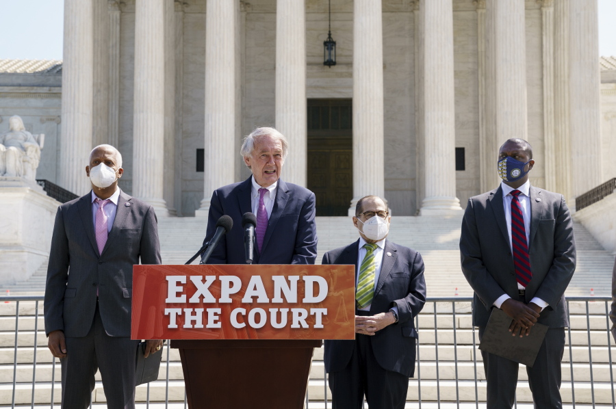 From left, Rep. Hank Johnson, D-Ga., Sen. Ed Markey, D-Mass., House Judiciary Committee Chairman Jerrold Nadler, D-N.Y., and Rep. Mondaire Jones, D-N.Y., hold a news conference outside the Supreme Court to announce legislation to expand the number of seats on the high court, on Capitol Hill in Washington, Thursday, April 15, 2021. (AP Photo/J.