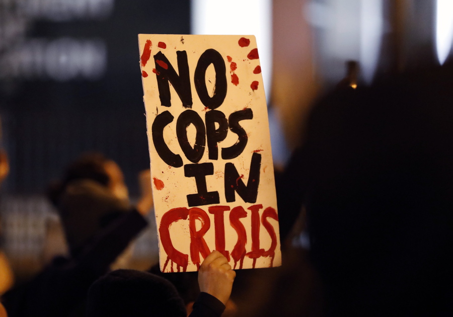 Protesters march up North Front Street, demonstrating against Monday's fatal shooting of a Black man in downtown Columbus, Ohio, on Tuesday, April 13, 2021. Miles Jackson was shot and killed inside Mount Carmel by police in Westerville, Ohio.