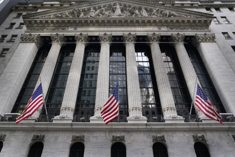 FILE - The New York Stock Exchange is seen in New York, Monday, Nov. 23, 2020. Stocks are off to a sluggish start on Wall Street Tuesday, April 27, 2021, pulling the S&P 500 slightly below the record high it set a day earlier.