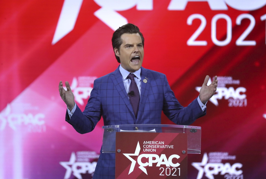This Feb. 26, 2021 photo shows U.S. Rep. Matt Gaetz -R-Florida, speaking at CPAC at the Hyatt Regency in Orlando, Fla. Gaetz, a prominent conservative in Congress and a close ally of former President Donald Trump, said Tuesday, March 30,  he is being investigated by the Justice Department over a former relationship but denied any criminal wrongdoing.  (Stephen M.
