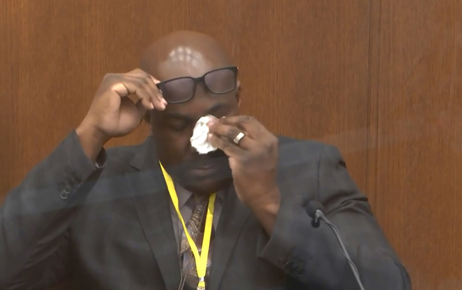 In this image from video, Philonise Floyd, brother of George Floyd, becomes emotional as he testifies as Hennepin County Judge Peter Cahill presides over court Monday, April 12, 2021, in the trial of former Minneapolis police Officer Derek Chauvin, in the May 25, 2020, death of George Floyd at the Hennepin County Courthouse in Minneapolis, Minn.