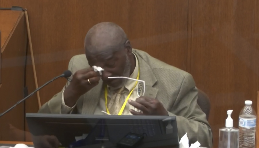 In this image from video, witness Charles McMillian becomes emotional as he answers questions as Hennepin County Judge Peter Cahill presides Wednesday, March 31, 2021, in the trial of former Minneapolis police Officer Derek Chauvin at the Hennepin County Courthouse in Minneapolis, Minn.  Chauvin is charged in the May 25, 2020 death of George Floyd.