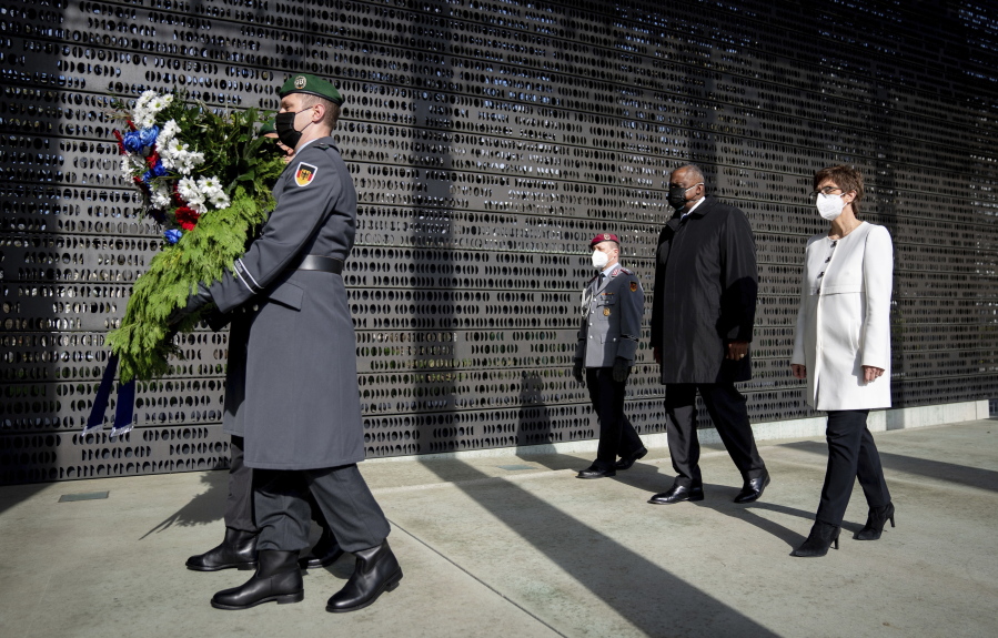 Annegret Kramp-Karrenbauer, Federal Minister of Defence, and U.S. Secretary of Defence Lloyd Austin lay down a wreath at the Federal Ministry of Defence in Berlin, Germany, Tuesday, April 13, 2021. This is the first visit to Germany by a minister of the new US administration. Austin will then travel on to Stuttgart, where he will talk to soldiers at the US command centres for troops in Africa and Europe.