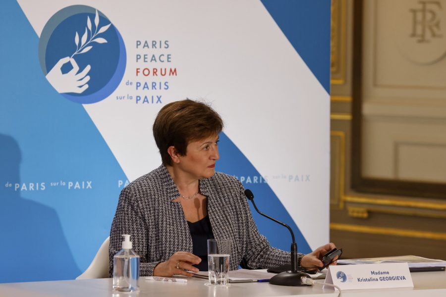 FILE - In this Nov. 12, 2020 file photo, International Monetary Fund Managing Director Kristalina Georgieva attends the Paris Peace Forum at The Elysee Palace in Paris.   Georgieva said Tuesday, March 30, 2021, that when the IMF releases its updated economic forecast next week, it will show the global economy growing at a faster pace than the 5.5% gain it projected at the start of the year.