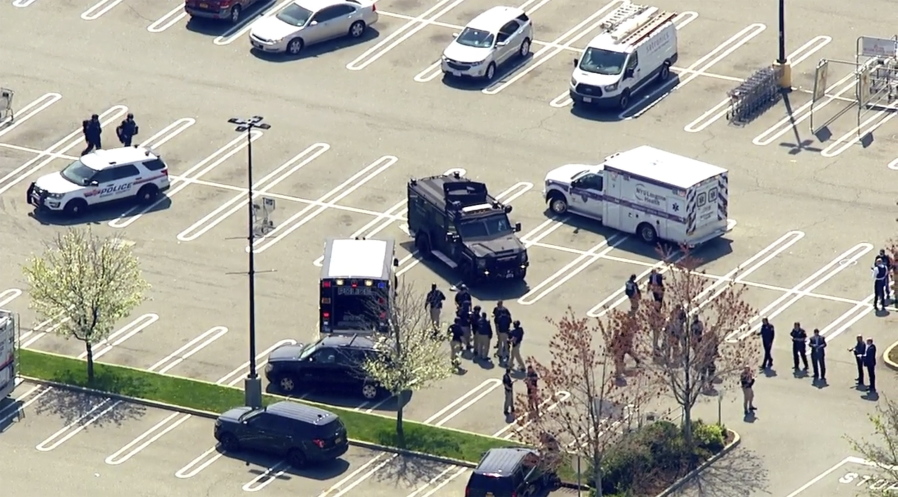 This aerial photo provided by WABC shows police responding to the scene of a shooting at a Stop & Shop supermarket in West Hempstead, N.Y., on Tuesday, April 20, 2021.   Nassau County Executive Laura Curran said in a tweet Tuesday there had been shooting at the Long Island supermarket and that the suspect has not been apprehended.