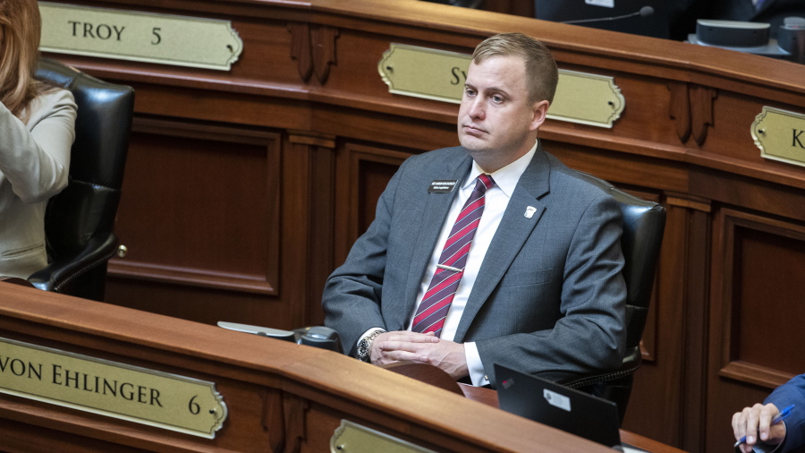 Rep. Aaron von Ehlinger, R-Lewiston, attends opening business as the Idaho House of Representatives convenes Wednesday, April 21, 2021 at the Statehouse in Boise, Idaho.   The Idaho lawmaker facing rape allegations from a 19-year-old intern was previously warned against hitting on women who work at the Statehouse after his colleagues heard complaints from other staffers, according to documents gathered by the Legislature's ethics committee and obtained by The Associated Press.  The Boise Police Department has a criminal investigation underway and the Legislature's Ethics Committee is scheduled to hold a public hearing on Wednesday, April 28.