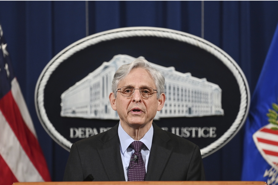 Attorney General Merrick Garland speaks at the Department of Justice in Washington, Monday, April 26, 2021. The Justice Department is opening a sweeping probe into policing in Louisville after the March 2020 death of Breonna Taylor, who was shot to death by police during a raid at her home.