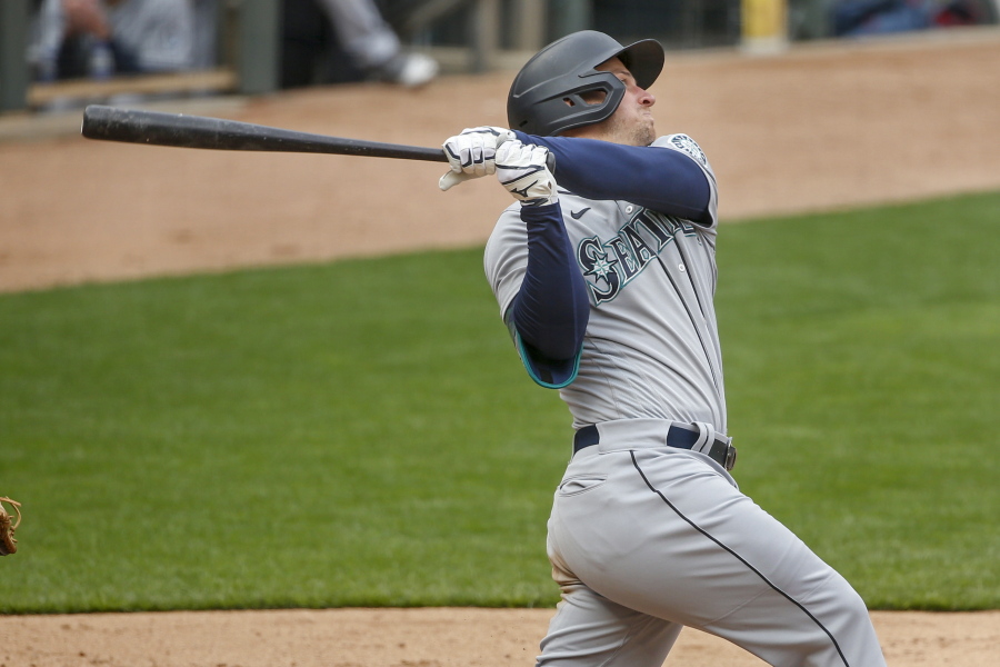 Seattle Mariners&#039; Kyle Seager hits a three-run home run against the Minnesota Twins in the ninth inning.