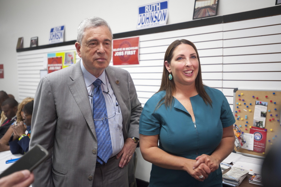 This August, 2020 photo, shows Ron Weiser, left, chairman of the Michigan Republican Party, and Ronna Romney McDaniel, National Republican Committee chairwoman. Michigan Republicans, once the national model for the party&#039;s mainstream, have lurched sharply rightward in the past decade.