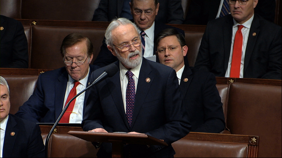 FILE - In this Dec. 18, 2019, file photo, Rep. Dan Newhouse, R-Wash., speaks as the House of Representatives debates the articles of impeachment against President Donald Trump at the Capitol in Washington. Newhouse voted to impeach Trump earlier this year, and now at least three Republicans have said they will challenge him in next year's election for the 4th U.S. House District seat, representing central Washington.