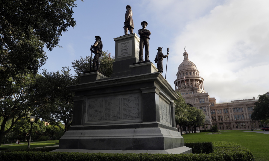 FILE - In this Aug. 21, 2017 file photo, the Texas State Capitol Confederate Monument stands on the south lawn in Austin, Texas. As a racial justice reckoning continues to inform conversations across the country, lawmakers nationwide are struggling to find solutions to thousands of icons saluting controversial historical figures.