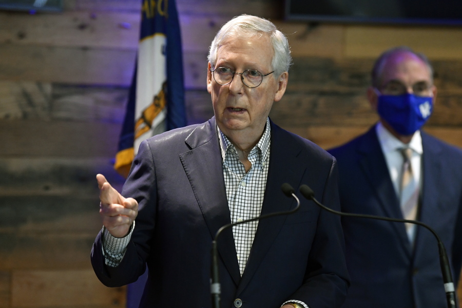 Senate Minority Leader Mitch McConnell, R-Ky., speaks during a news conference at Kroger Field in Lexington, Ky., Monday, April 5, 2021. (AP Photo/Timothy D.