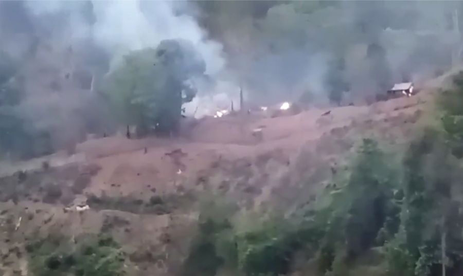 In this image made from video by the Transborder News, smoke rises from a Myanmar Army camp near the border of Myanmar and Thailand Tuesday, April 27, 2021. Ethnic Karen guerrillas said they captured a Myanmar army base Tuesday in what represents a morale-boosting action for those opposing the military's takeover of the country's civilian government in February.