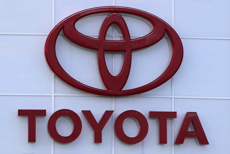 This Aug. 15, 2019 file photo shows the Toyota logo on a dealership in Manchester, N.H. Toyota is recalling nearly 280,000 Venza SUVs in the U.S., Thursday, April 15, 2021,  because a wiring problem could stop the side air bags from inflating in a crash. The recall covers Venzas from the 2009 through 2015 model years.