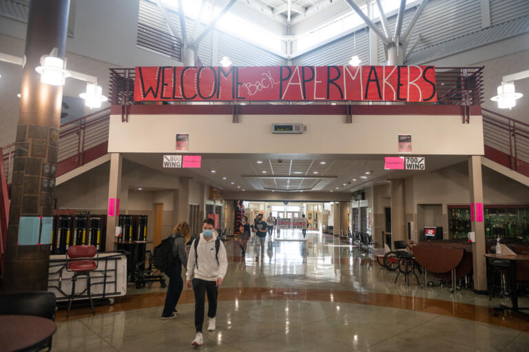 Students enter Camas High School before the first bell rang on Monday, April 19, 2021. Camas returned to four-day-a-week in-person instruction on Monday.
