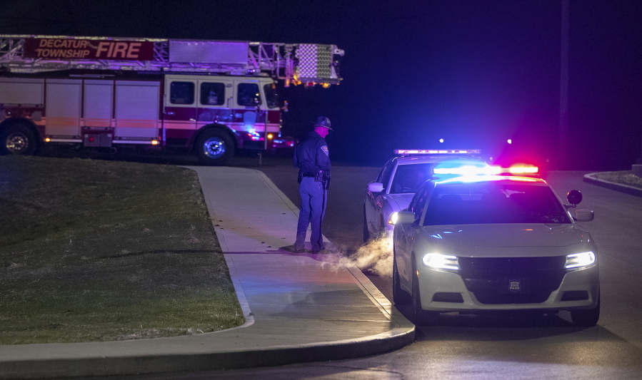 Police and fire teams arrive at the scene outside a FedEx facility in Indianapolis where multiple people were reportedly shot at the FedEx Ground facility early Friday, April 16, 2021, in Indianapolis, Indiana. Multiple people were shot and killed in a late-night shooting at a FedEx facility in Indianapolis, and the shooter killed himself, police said.
