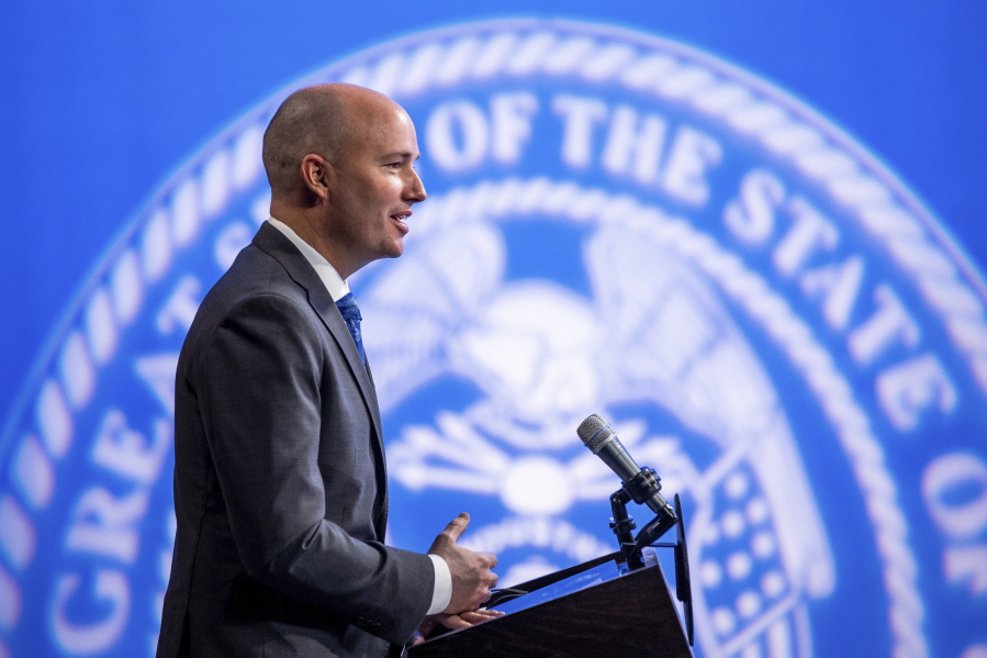 Utah Gov. Spencer Cox speaks during his monthly news conference on March 18, 2021, in Salt Lake City. Cox has signed a law requiring biological fathers to pay half of a woman&#039;s out-of-pocket pregnancy costs.