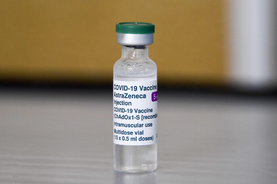FILE - In this Sunday, March 21, 2021 file photo, a vial of of the AstraZeneca COVID-19 vaccine at the Guru Nanak Gurdwara Sikh temple, on the day the first Vaisakhi Vaccine Clinic is launched, in Luton, England. A top official at the European Medicines Agency says there&#039;s a causal link between the AstraZeneca coronavirus vaccine and rare cases of blood clots, but he says the benefits of getting the vaccine still outweigh the risks, it was reported on Tuesday, April 6, 2021.