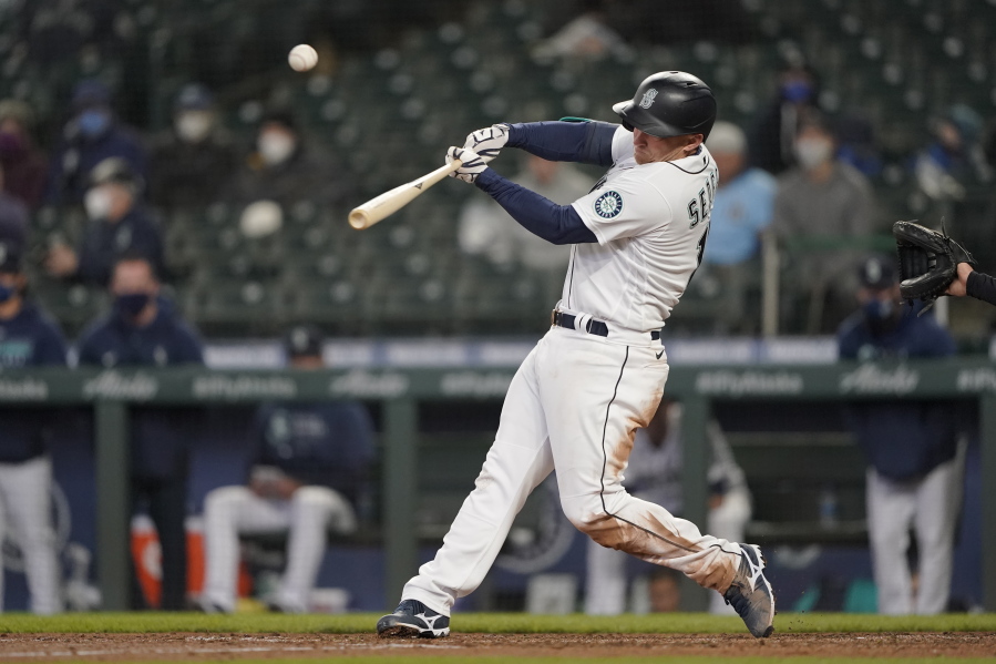 Seattle Mariners&#039; Kyle Seager hits a three-run double during the sixth inning of the team&#039;s baseball game against the Chicago White Sox, Wednesday, April 7, 2021, in Seattle. (AP Photo/Ted S.