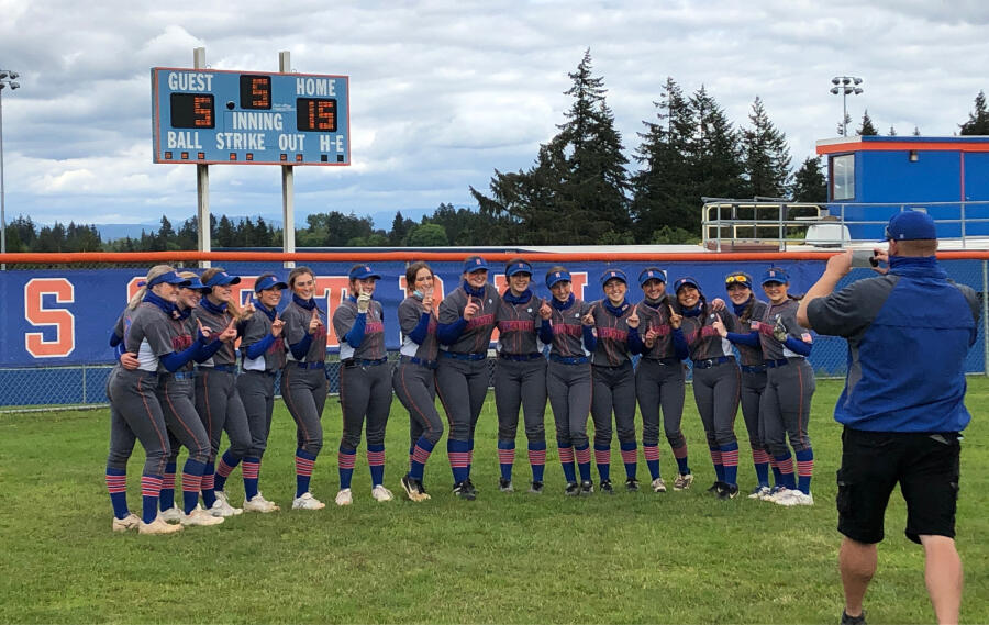 The Ridgefield softball team poses for a photo after beating Columbia River 15-5 on Saturday at Ridgefield High. The win clinched the 2A Greater St. Helens League title for the Spudders.