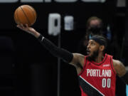 Portland Trail Blazers forward Carmelo Anthony shoots against the Charlotte Hornets during the first half in an NBA basketball game on Sunday, April 18, 2021, in Charlotte, N.C.