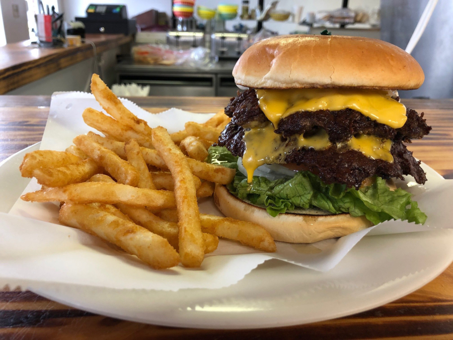 At the Florissant City Diner, the double cheeseburger and fries are a popular order.(Daniel Neman/St.