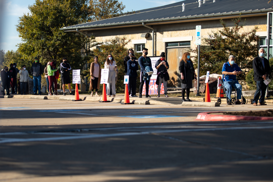 People wait in line to vote at  Dan Ruiz Branch Library on November 3, 2020, in Austin, Texas.
