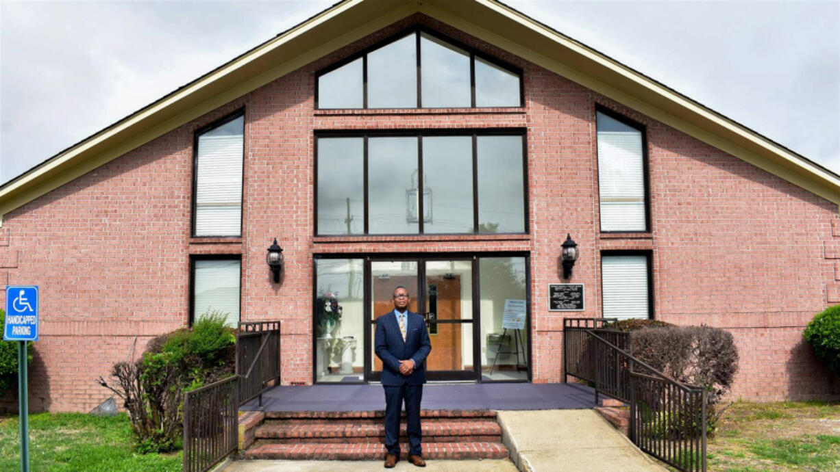The Rev. JeVon Marshall, who advocates for therapy for his congregation, stands outside of Antioch Missionary Baptist Church in Walls, Mississippi, where he is a pastor. Marshall and other advocates and professionals argue strongly for additional mental health and financial aid measures to address the trauma Black people face because of policing issues.