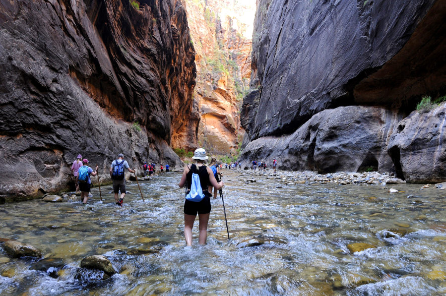 Zion National Park in Utah is expected to be a popular destination on Memorial Day weekend. Above, the Virgin River snakes through the Narrows in the park in 2019.