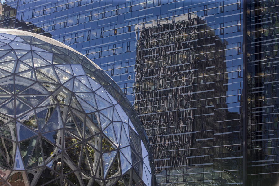 Diversity issues have dogged Amazon, and much of the tech industry, since at least 2014. Above, an Amazon tower is reflected in the Amazon Day 1 building above the Amazon Spheres in Seattle.