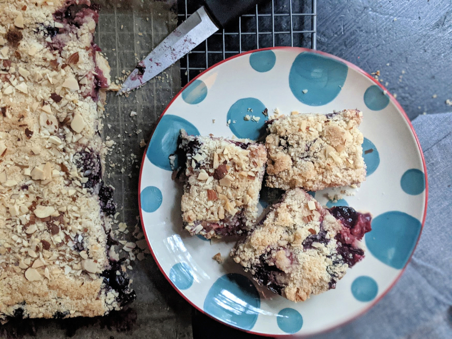A mix of blueberries and chopped strawberry offer a taste of summer in these easy crumble bars.