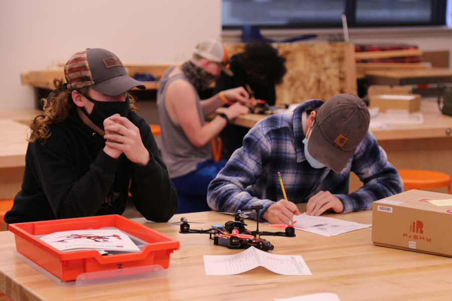 RIDGEFIELD: Tucker Alexander and Caden Anderson worked as a team to build a drone in Steve Rinard's engineering class