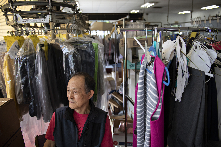 Haeng Chong, who's owned Fourth Plain One Hour Dry Cleaning for 40 years with his wife, pauses for a portrait Wednesday, May 12. Last year, Chong's business received $16,000 through a small business grant program that just reopened for a third time. Applications are due May 19.