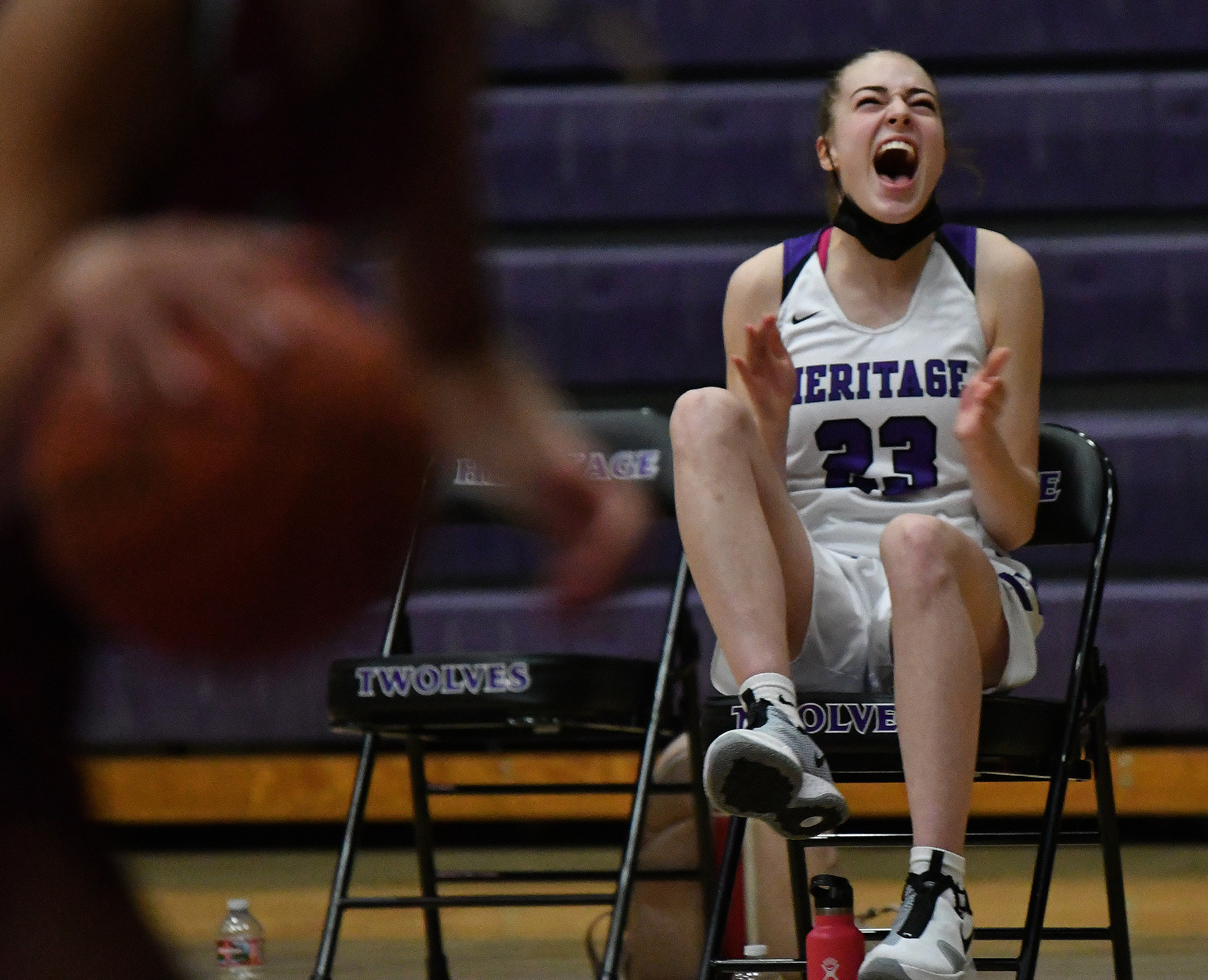 Heritage junior Paige Kirby celebrates after a three-point shot Thursday, May 20, 2021, during the Timberwolves' 53-42 win against the Falcons at Heritage High School in Vancouver.