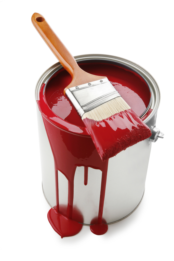 paint bucket with red paint and brush on white background.
