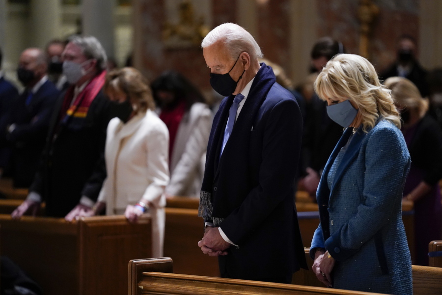 FILE - In this Wednesday, Jan. 20, 2021 file photo, President-elect Joe Biden and his wife, Jill Biden, attend Mass at the Cathedral of St. Matthew the Apostle during Inauguration Day ceremonies in Washington. When U.S. Catholic bishops hold their next national meeting in June 2021, they'll be deciding whether to send a tougher-than-ever message to President Joe Biden and other Catholic politicians: Don't partake of Communion if you persist in public advocacy of abortion rights.