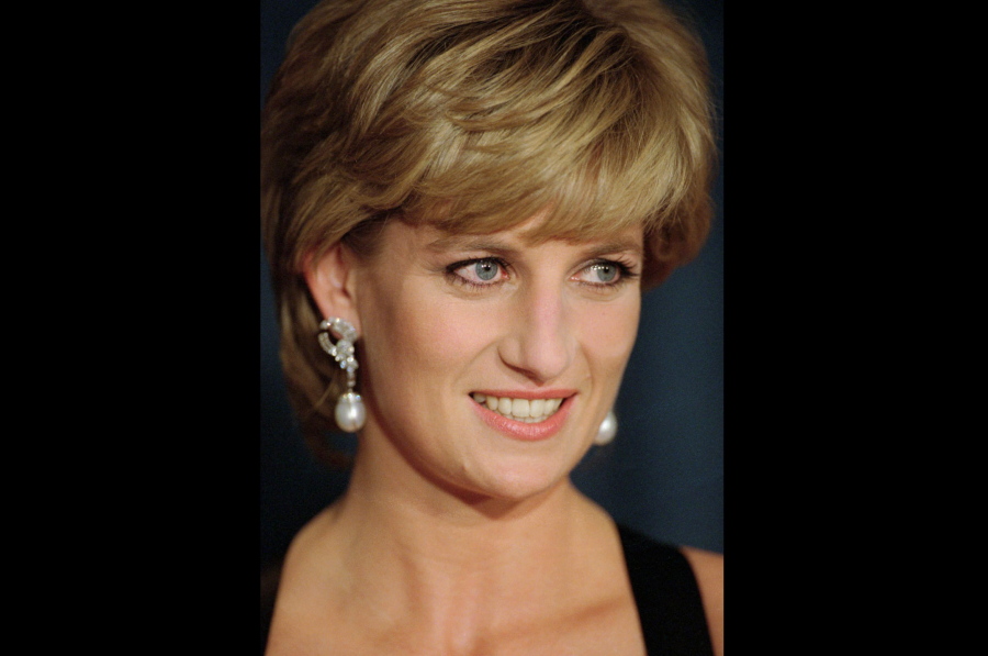 FILE - In this Dec. 11, 1995 file photo, Diana, Princess of Wales, smiles at the United Cerebral Palsy's annual dinner at the New York Hilton. An investigation has found that a BBC journalist used "deceitful behavior" to secure an explosive interview with Princess Diana in 1995, in a "serious breach" of the broadcaster's guidelines. The probe came after Diana's brother, Charles Spencer, made renewed complaints that journalist Martin Bashir used false documents and other dishonest tactics to persuade Diana to agree to the interview.