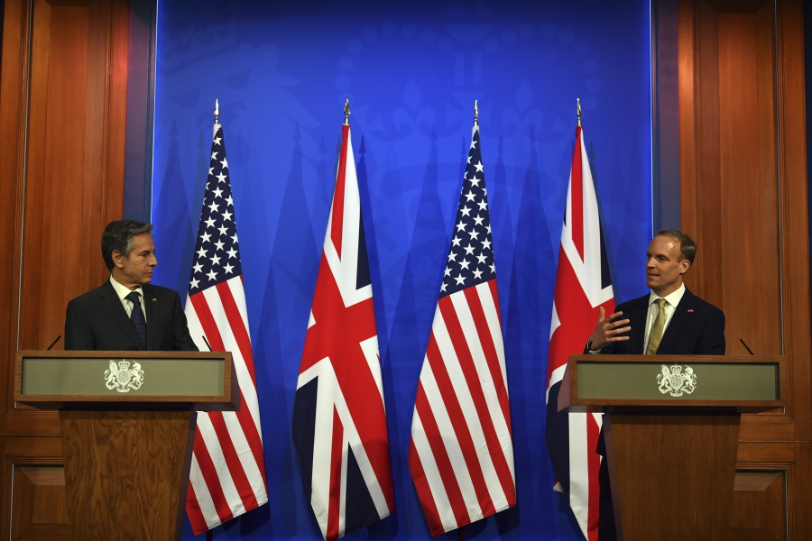 Britain's Foreign Secretary Dominic Raab, right, and US Secretary of State Antony Blinken attend a joint press conference at Downing Street in London, Monday, May 3, 2021, during the G7 foreign ministers meeting.