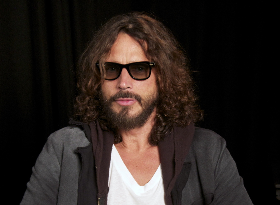 FILE - This Sept. 23, 2011 file photo shows musician Chris Cornell in New York. The family of Chris Cornell and a doctor who they alleged over-prescribed him drugs before he died have agreed to a settle a lawsuit. Documents filed in Los Angeles court by attorneys for the rock singer's widow and their children said a confidential settlement had been reached. The documents were filed in April, but had gone unnoticed before City News Service reported on them Thursday, May 6, 2021.