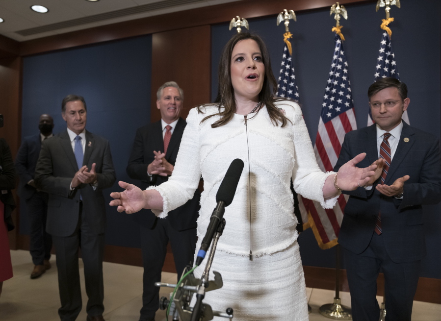 Rep. Elise Stefanik, R-N.Y., speaks to reporters at the Capitol in Washington, Friday, May 14, 2021, just after she was elected chair of the House Republican Conference, replacing Rep. Liz Cheney, R-Wyo., who was ousted from the GOP leadership for criticizing former President Donald Trump. She is joined by, from left, Rep. Gary Palmer, R-Ala., House Minority Leader Kevin McCarthy, R-Calif., and Rep. Mike Johnson, R-La. (AP Photo/J.