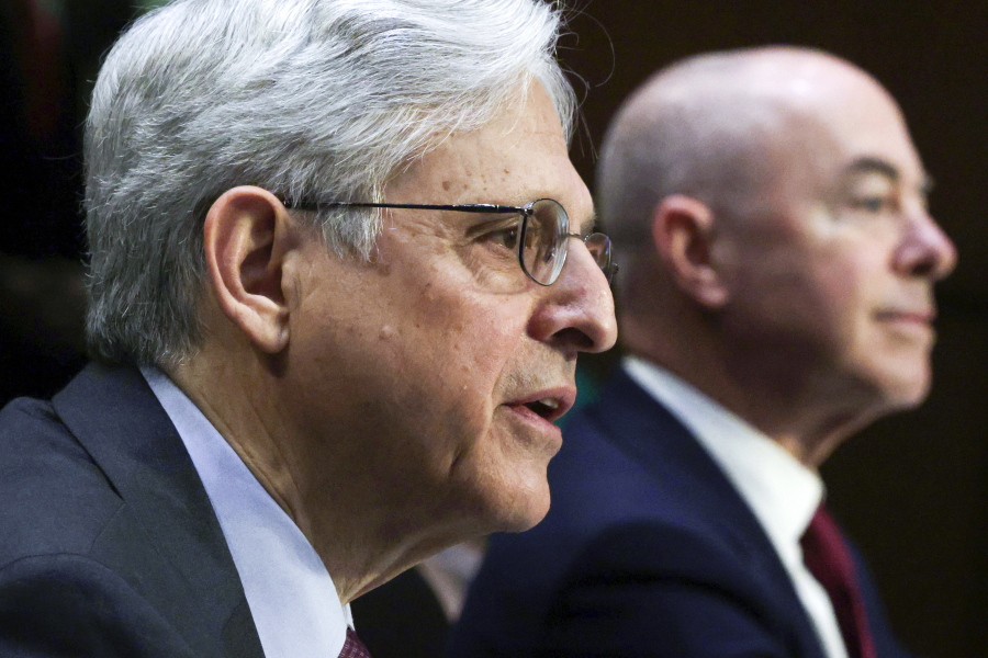 Attorney General Merrick Garland, left, and Homeland Security Secretary Alejandro Mayorkas, testify before the Senate Appropriations committee hearing to examine domestic extremism, Wednesday, May 12, 2021 on Capitol Hill in Washington.