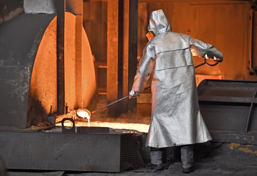 FILE - In this April 27, 2018 photo a worker controls iron at the Thyssenkrupp steel factory in Duisburg, Germany. The European Union and the United States have decided to temporarily suspend measures at the heart of a steel tariff dispute that is seen as one of the major trade issues dividing the two sides. The issue goes back to the 2018 tariffs that then-President Donald Trump slapped on EU steel and aluminum, which enraged Europeans and other allies by calling their metals a threat to U.S. national security.